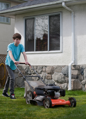 teenager mowing lawn teenager mowing lawn